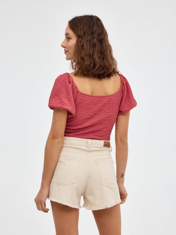 Flared shorts sand middle back view