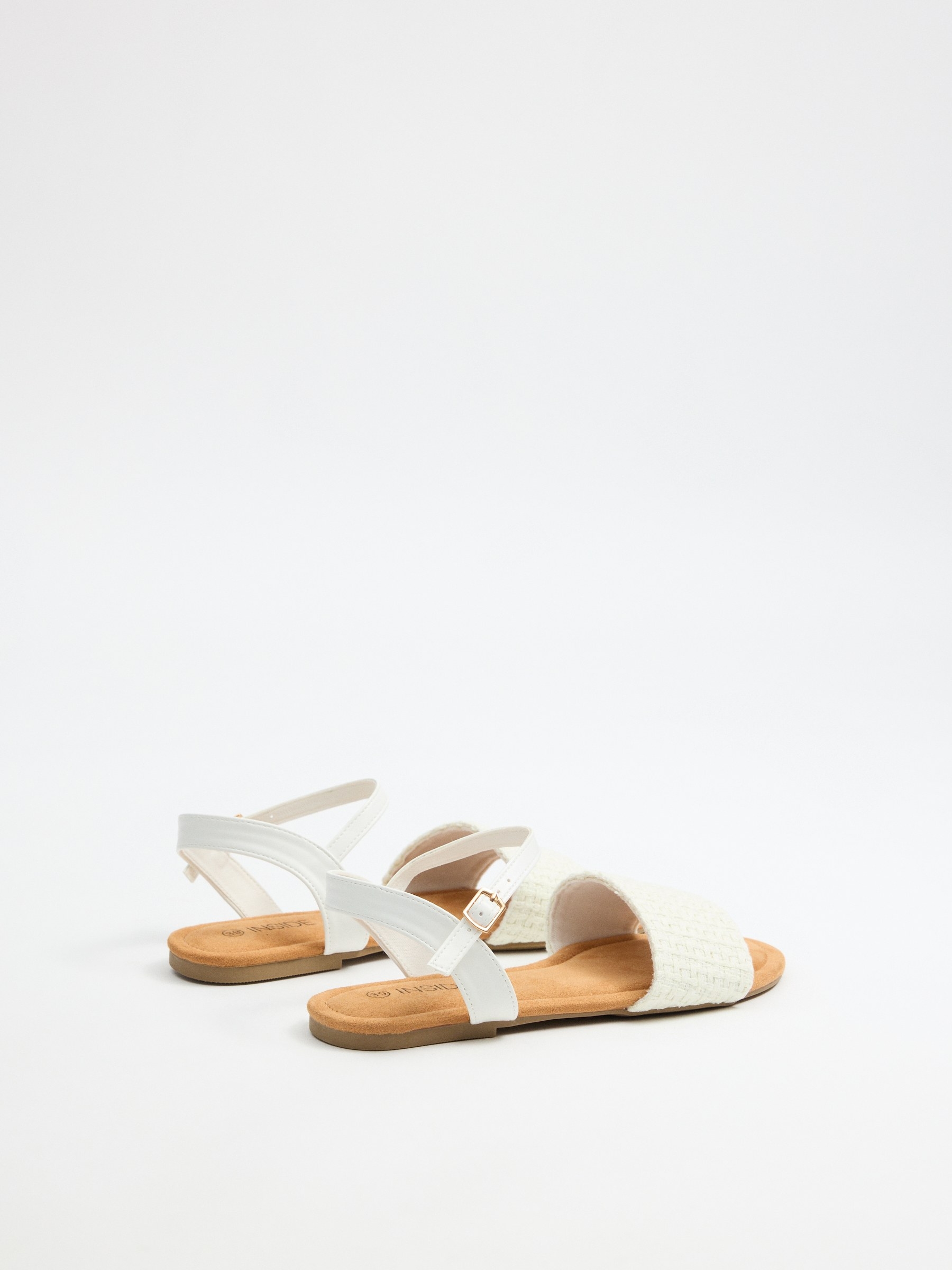 Off-white braided flat sandal off white profile view