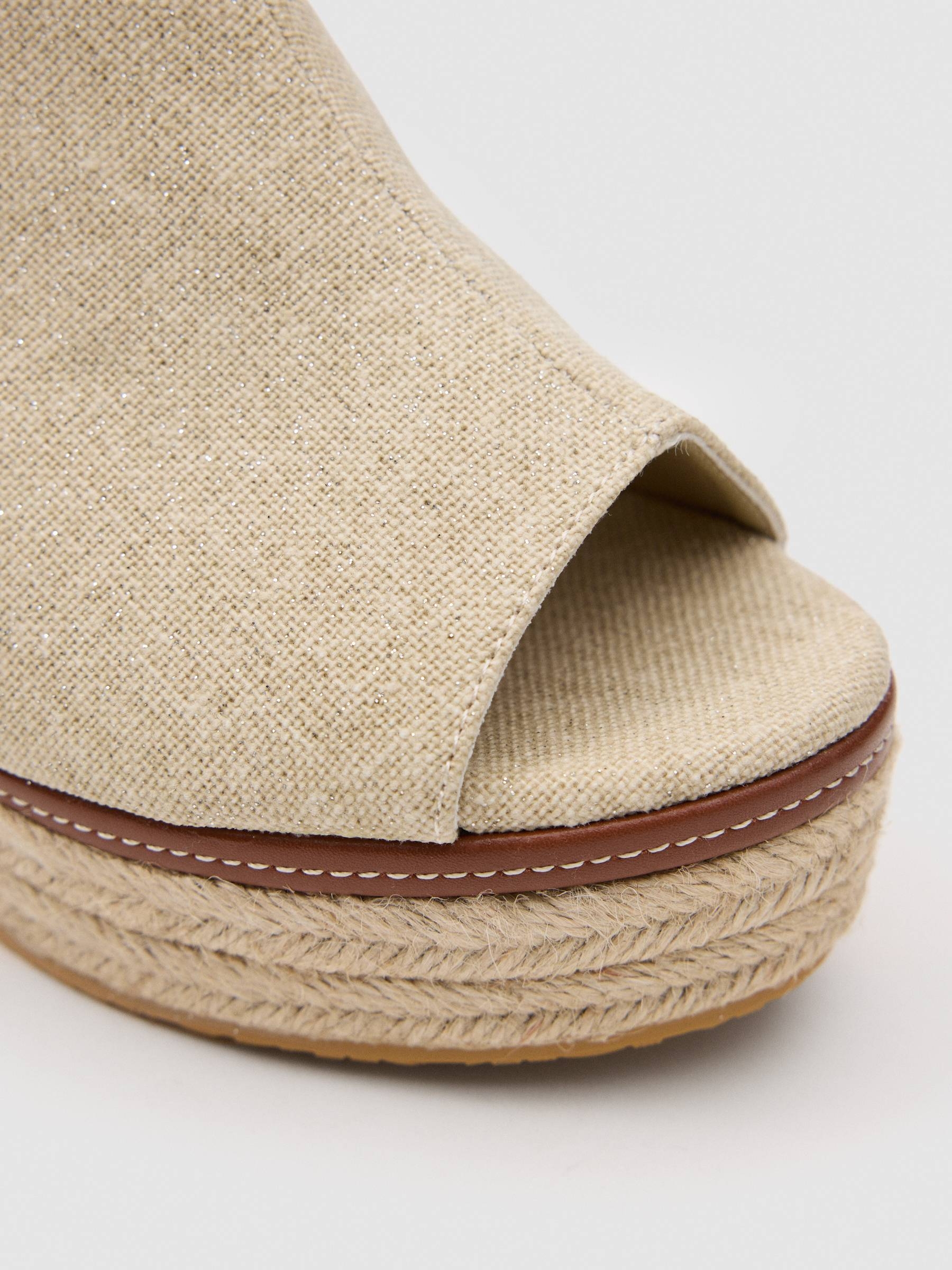 Zueco abertura arena