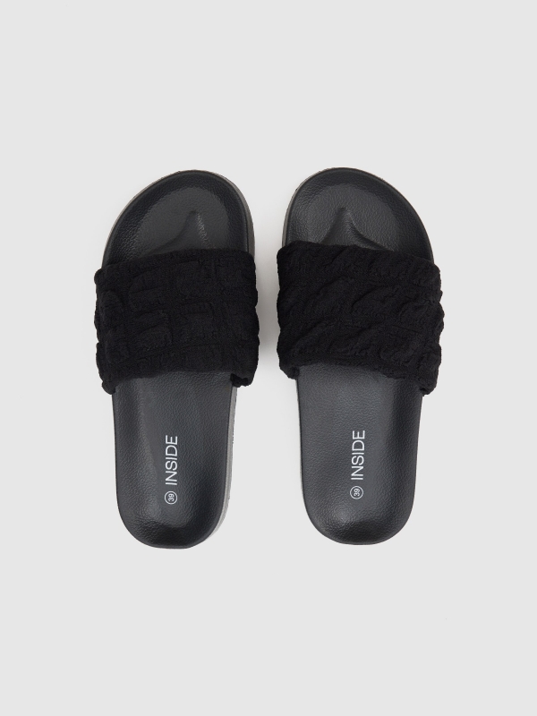 Shiny flip flops black 45º back view