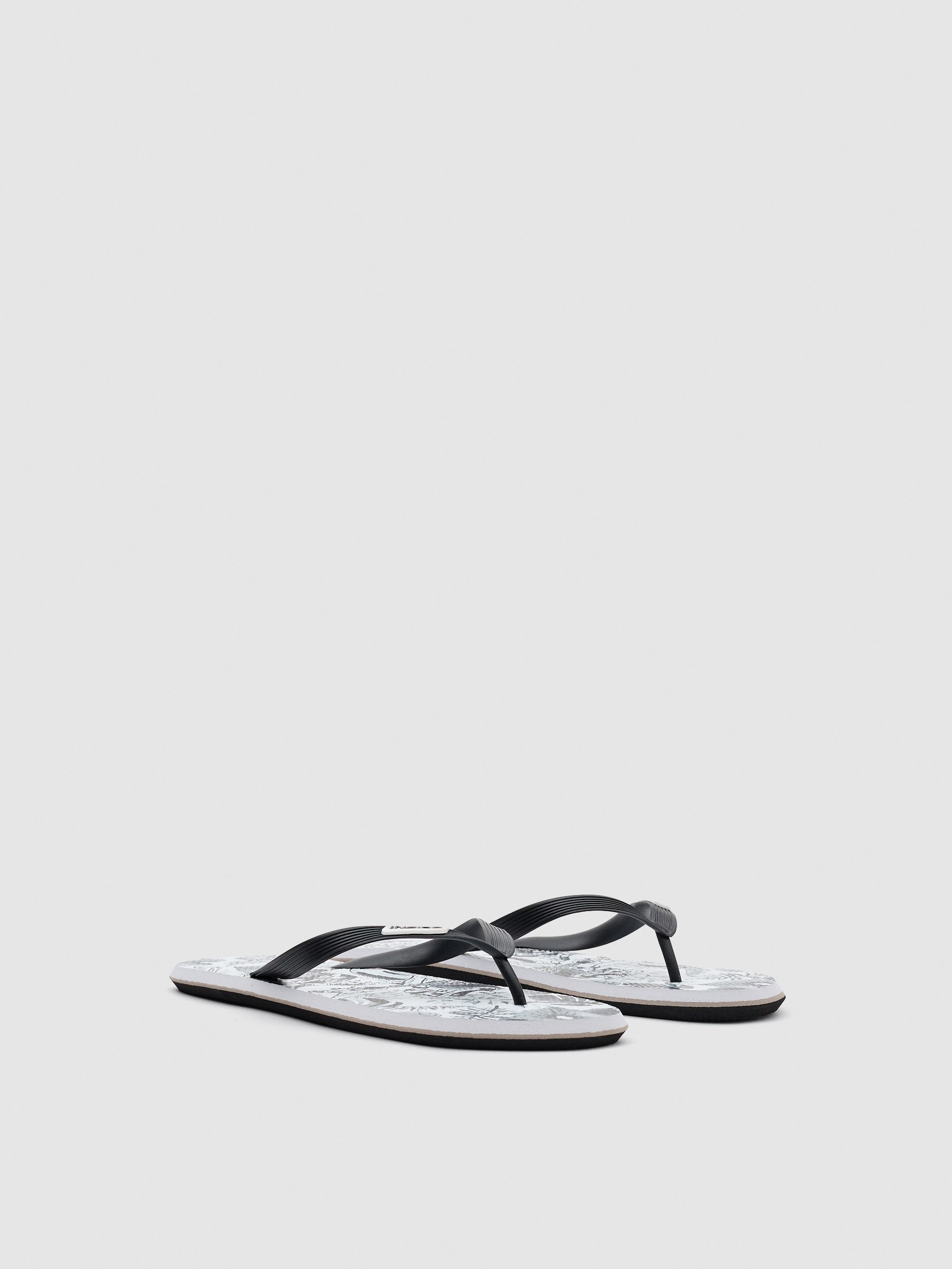 Skeleton flip flop black