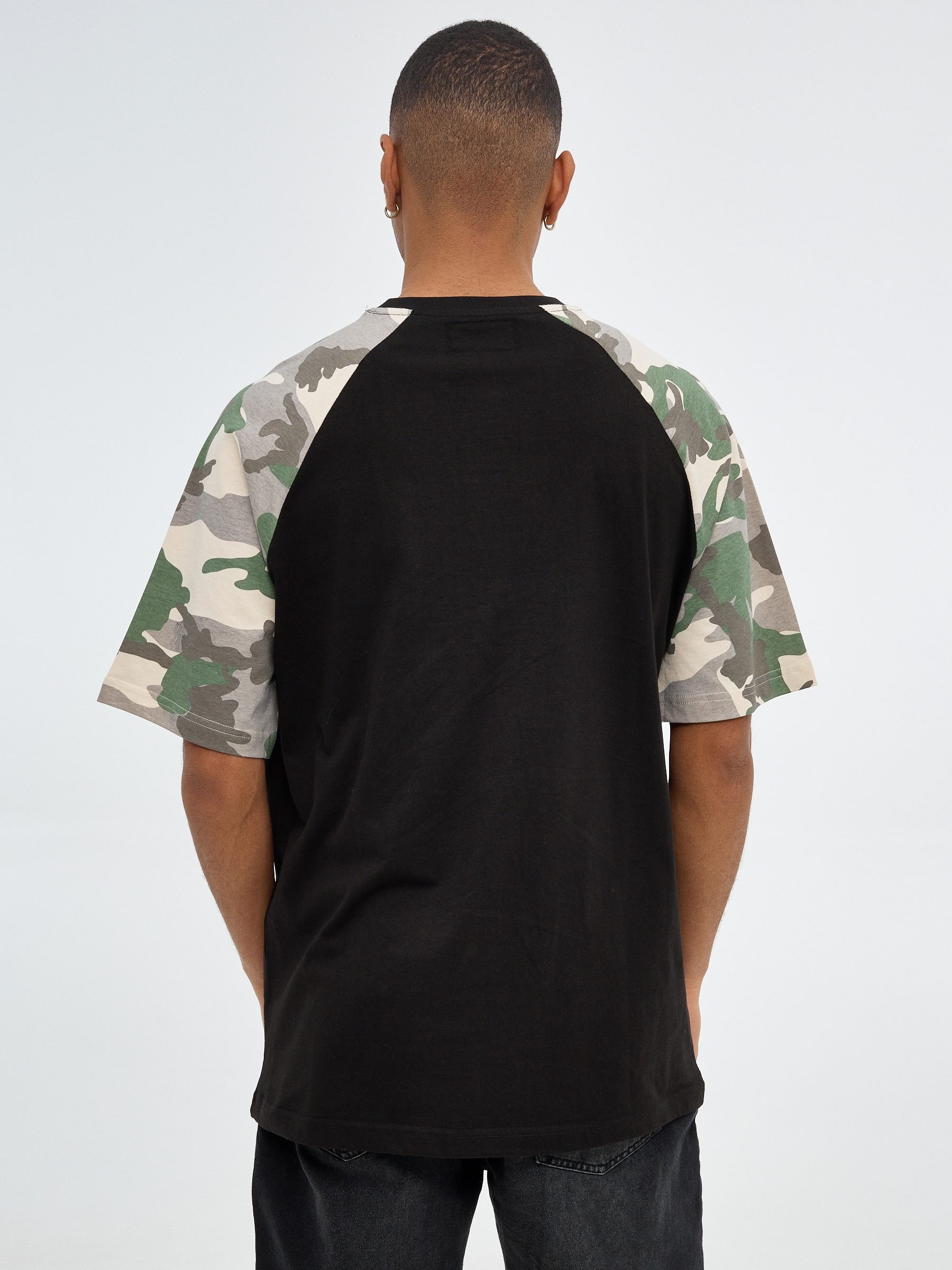 Text and camouflage t-shirt black middle front view