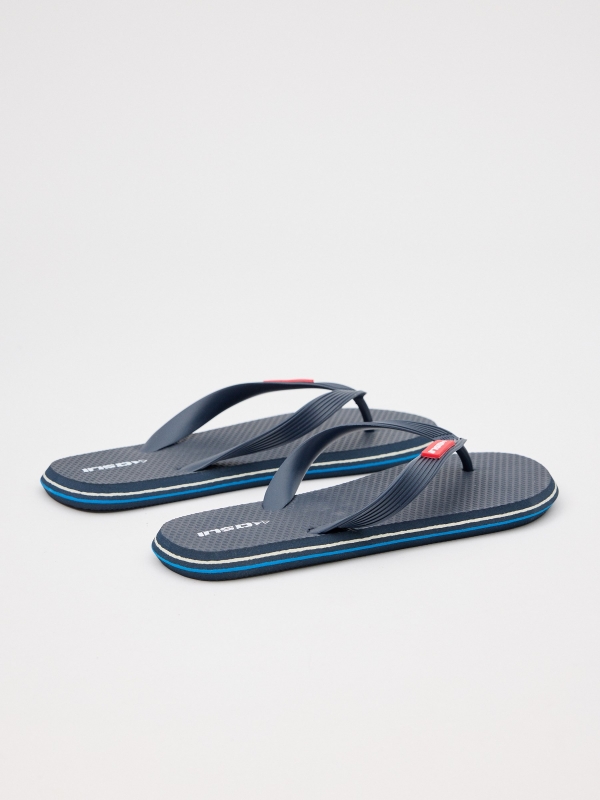 Navy blue flip-flops navy 45º back view
