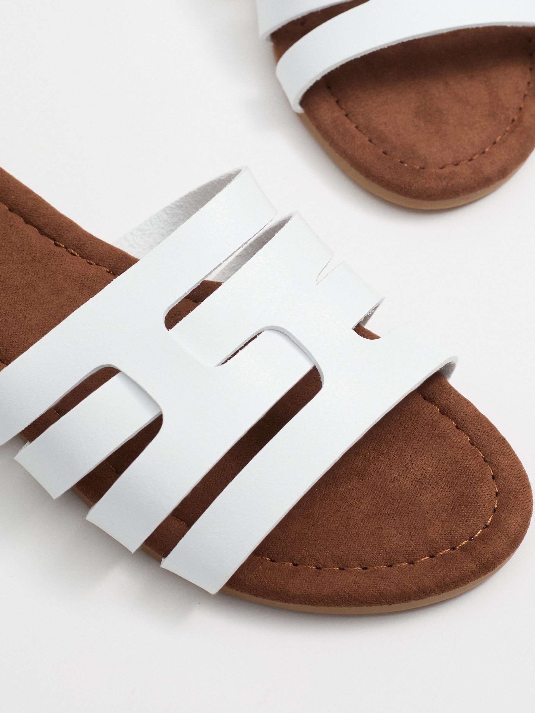 White interwoven slide sandal