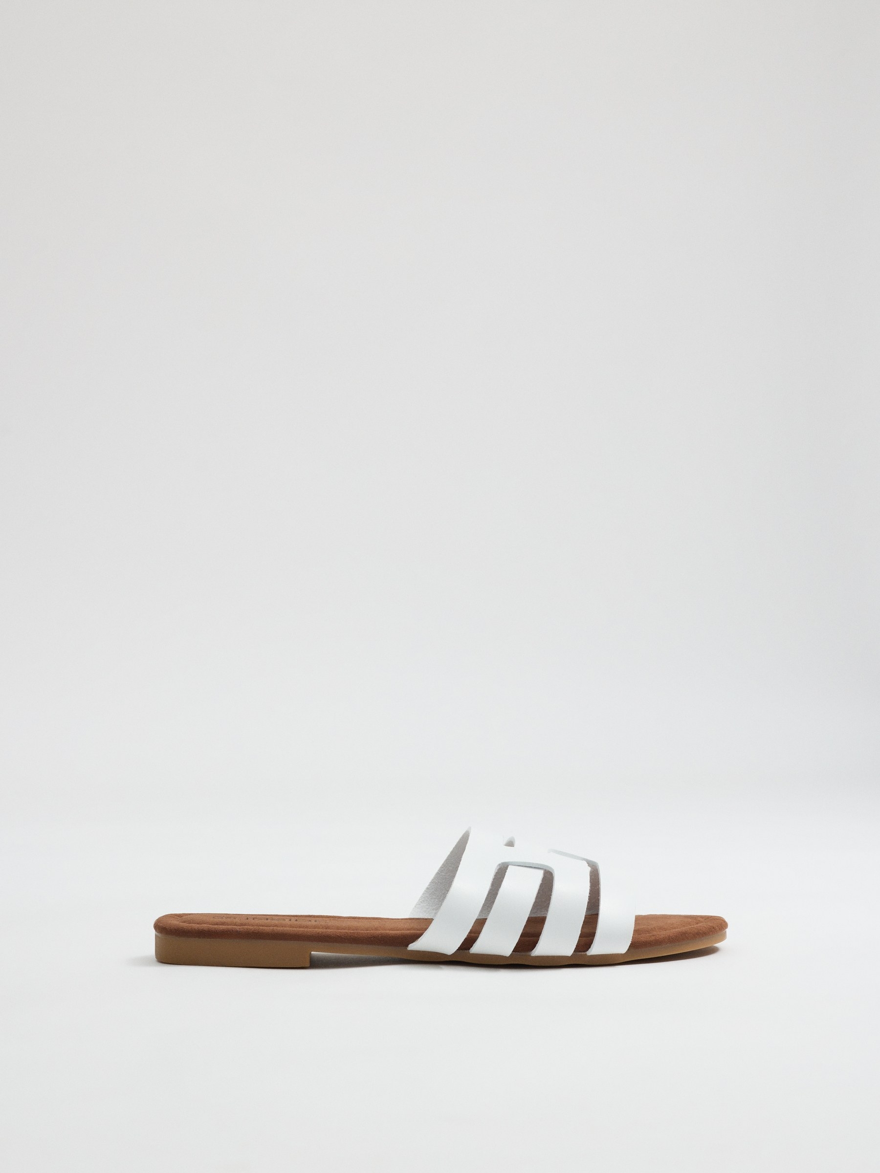 White interwoven slide sandal