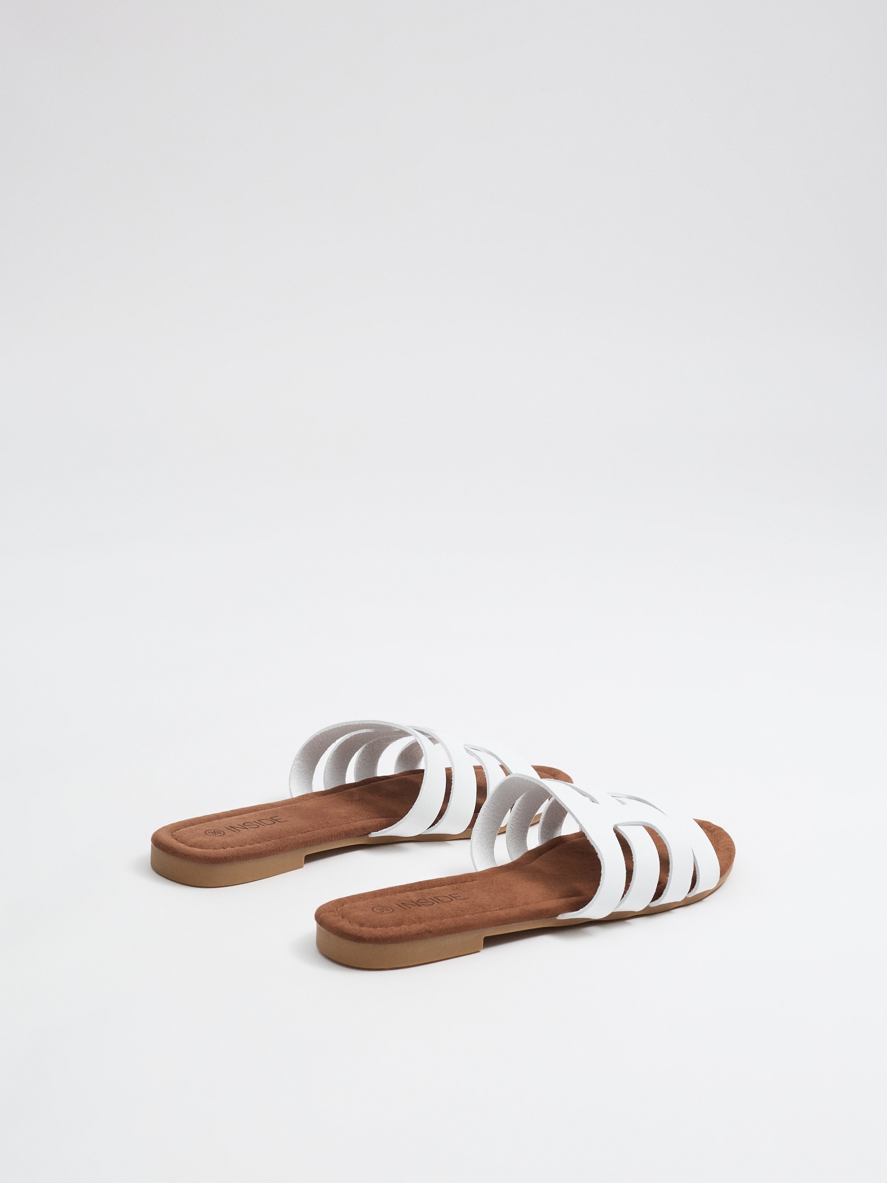White interwoven slide sandal