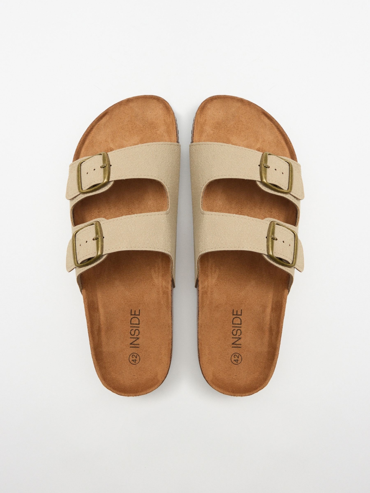 Flat sandal with double strap buckle sand. sand detail view