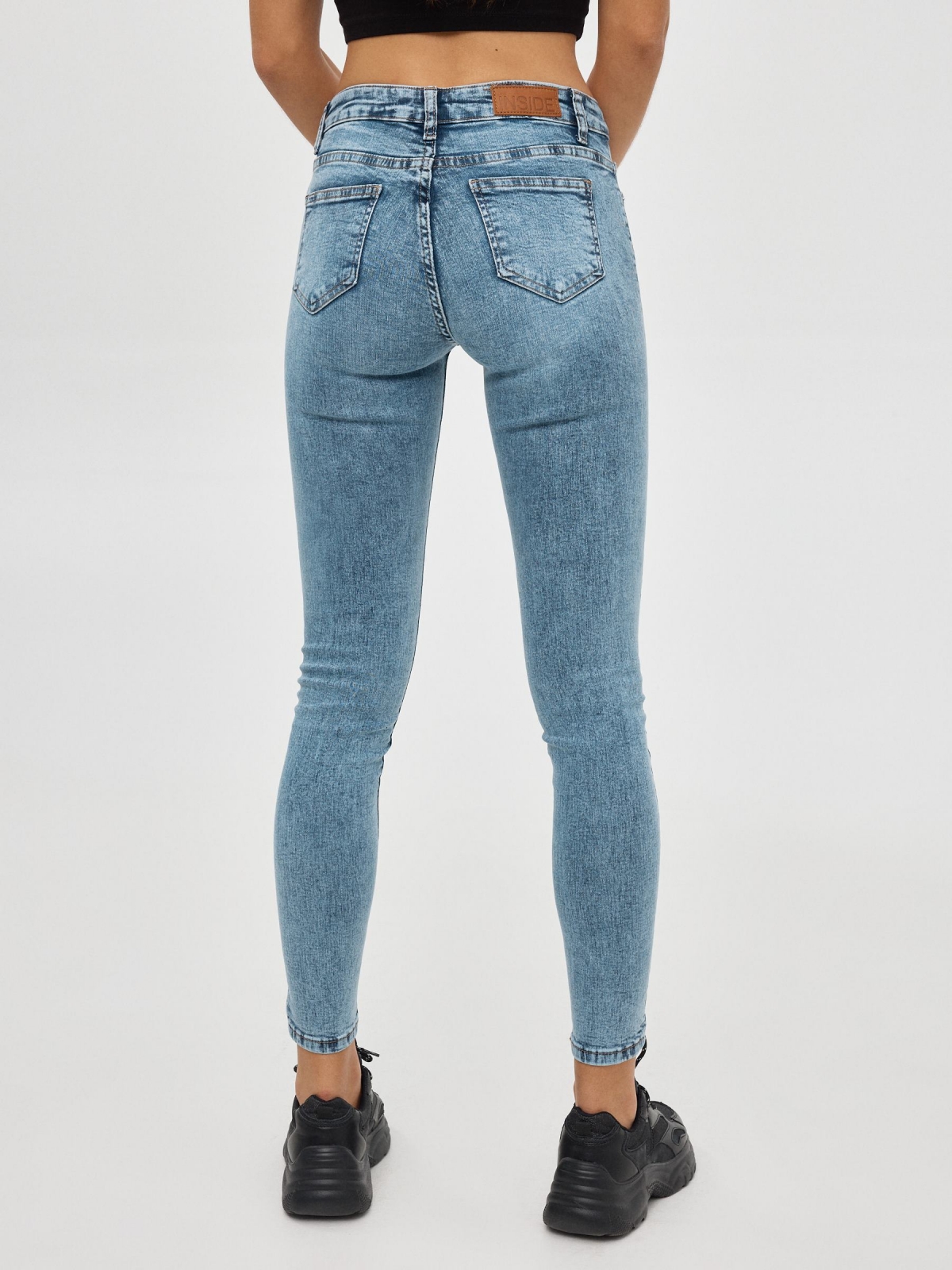Mid rise skinny jeans blue middle back view