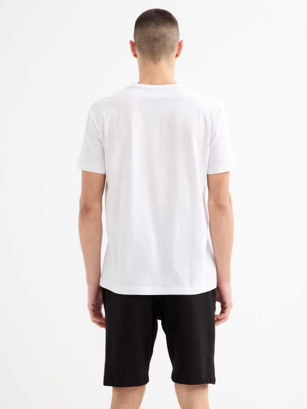 T-shirt gráfica com bolso branco vista meia traseira