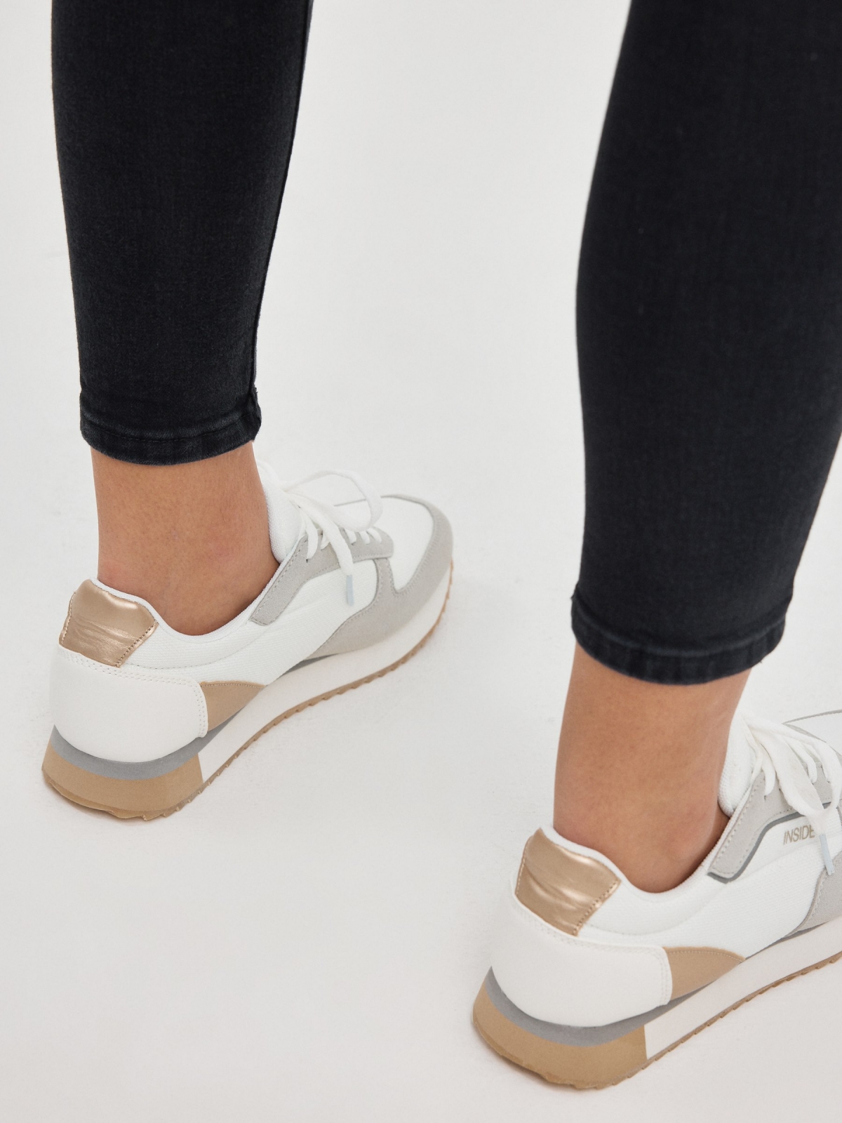 High rise skinny jeans black detail view