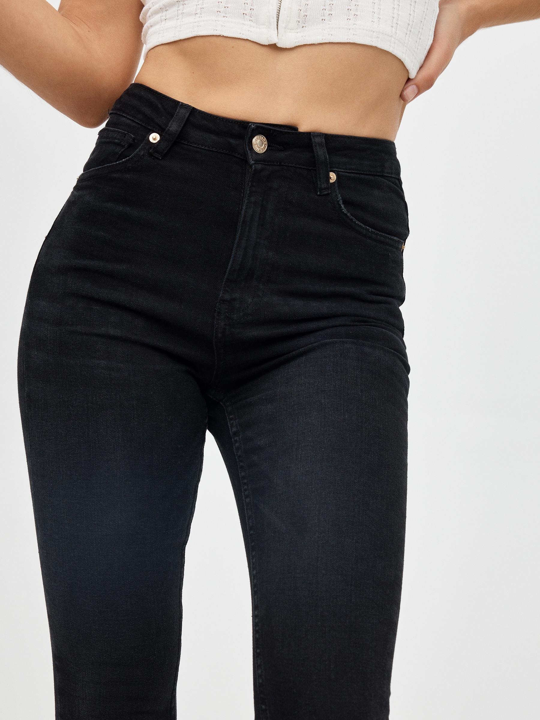 High rise skinny jeans black front view