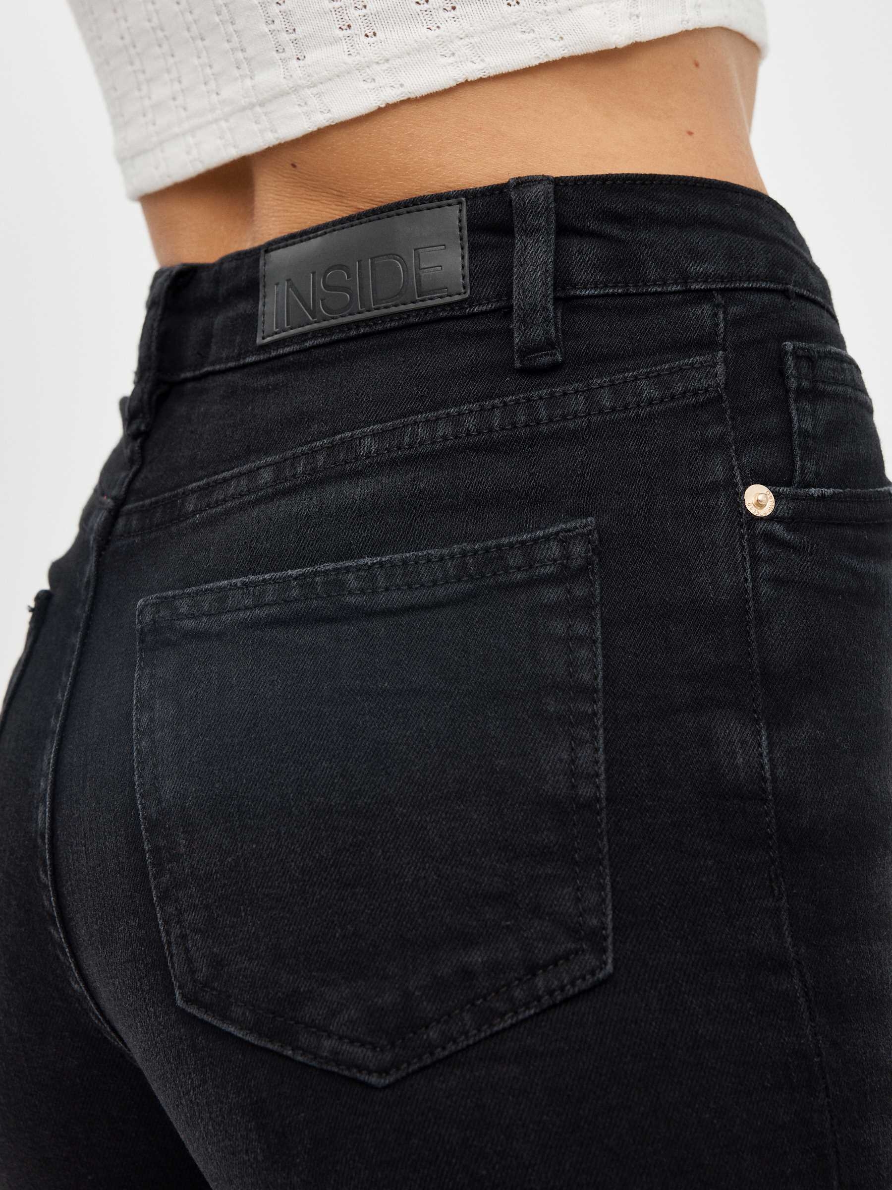 High rise skinny jeans black front view