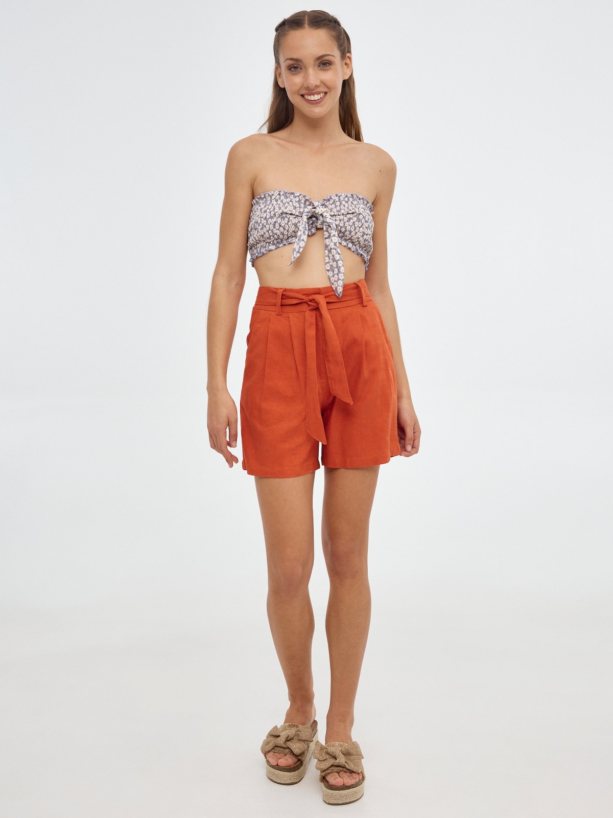 Rustic clamp shorts brick red front view