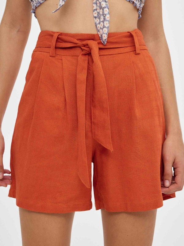 Rustic clamp shorts brick red detail view