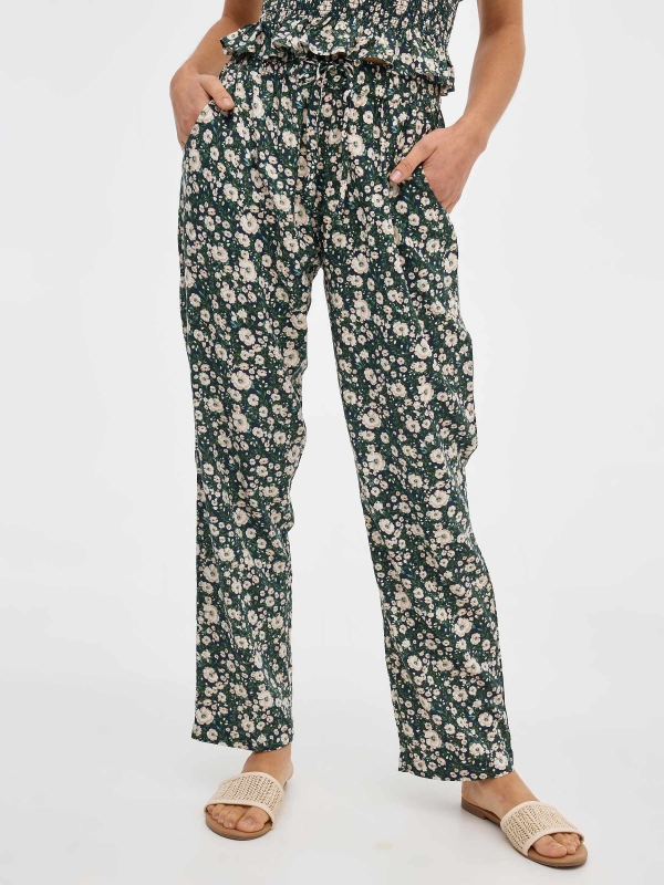 Flowing floral print pants navy middle back view