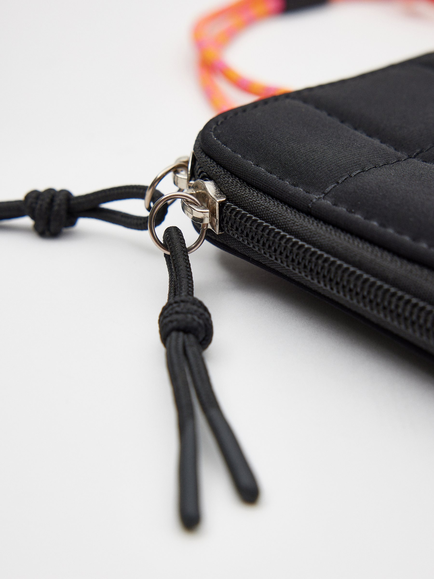 Bolso mini cordón naranja negro