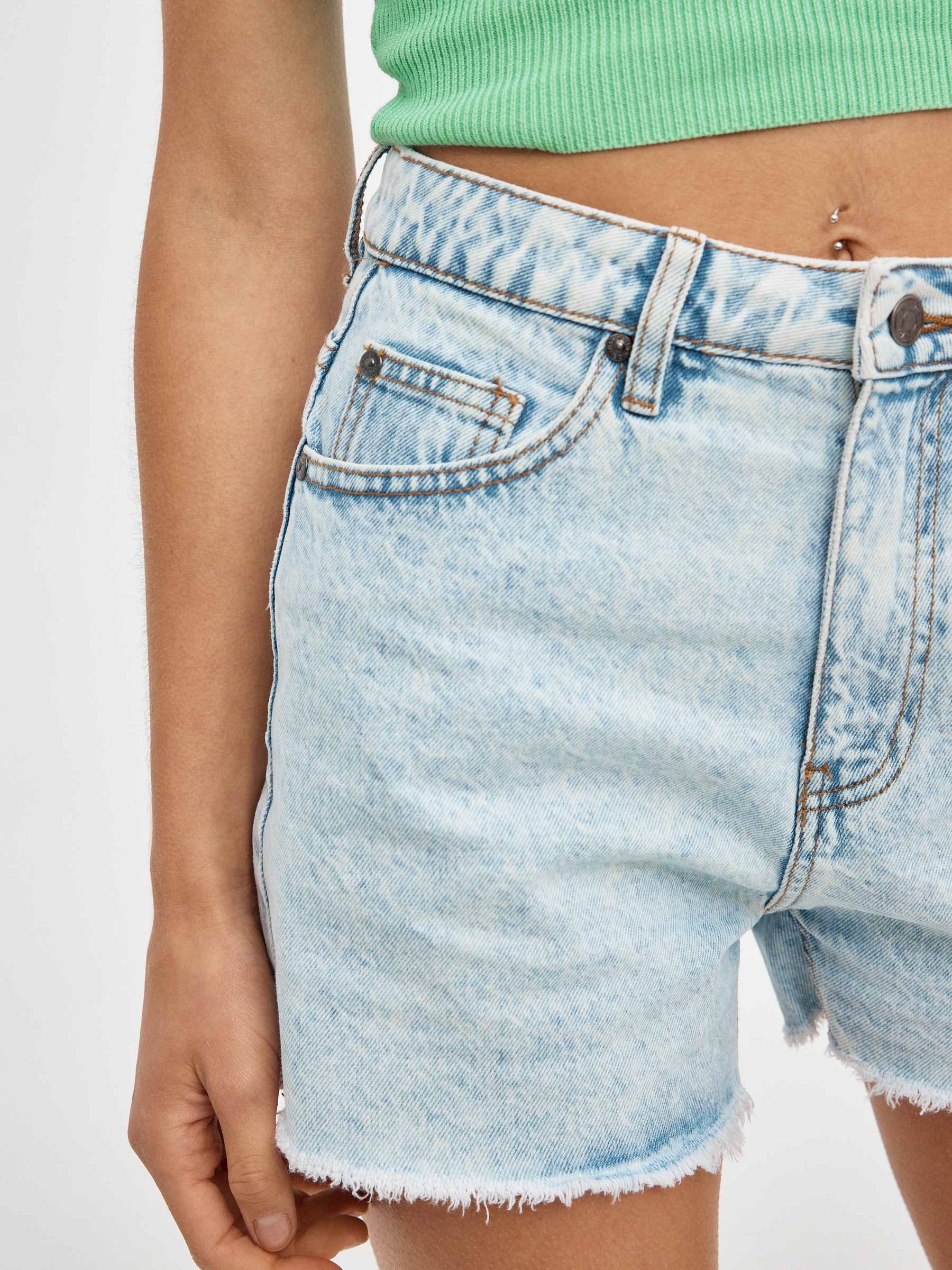Frayed denim shorts light blue middle front view