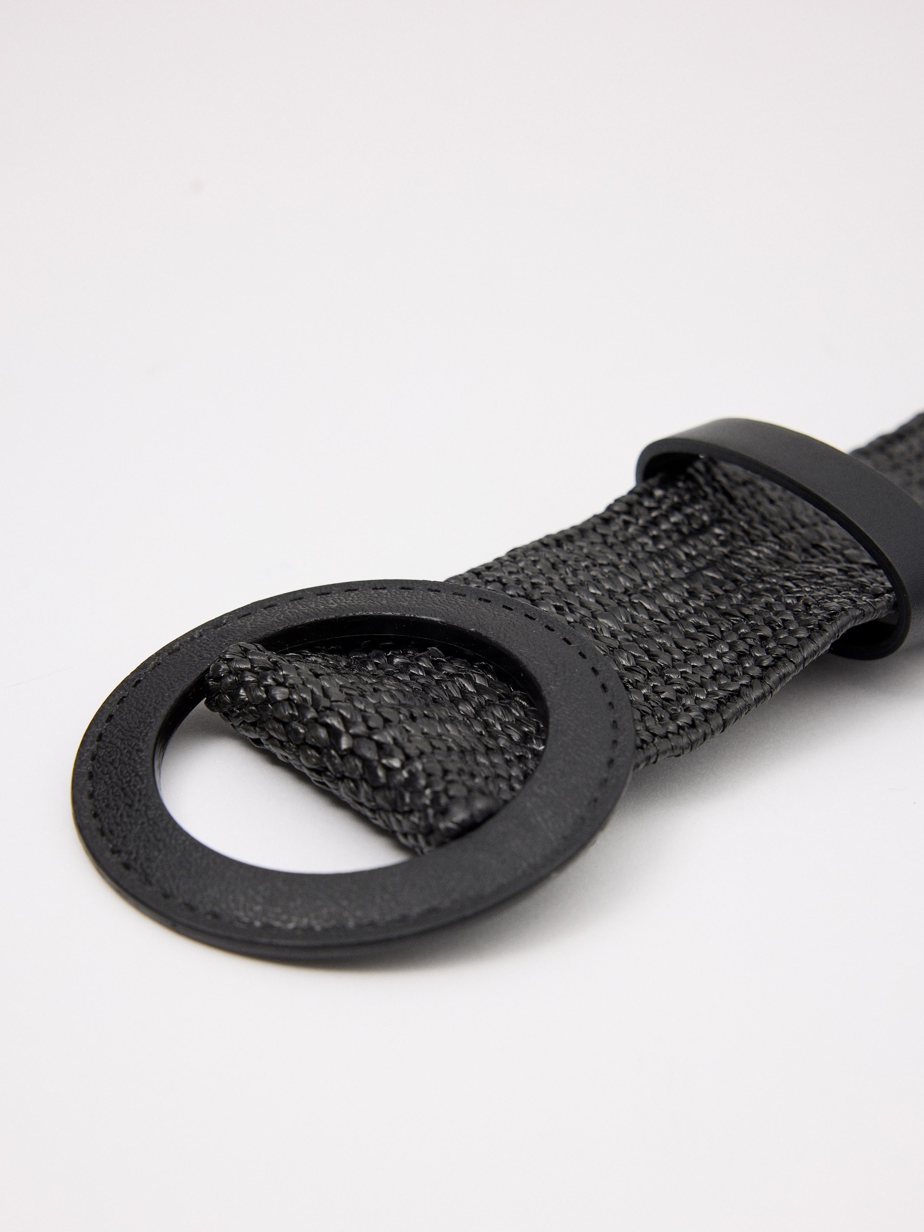 Round buckle elastic belt black rolled view