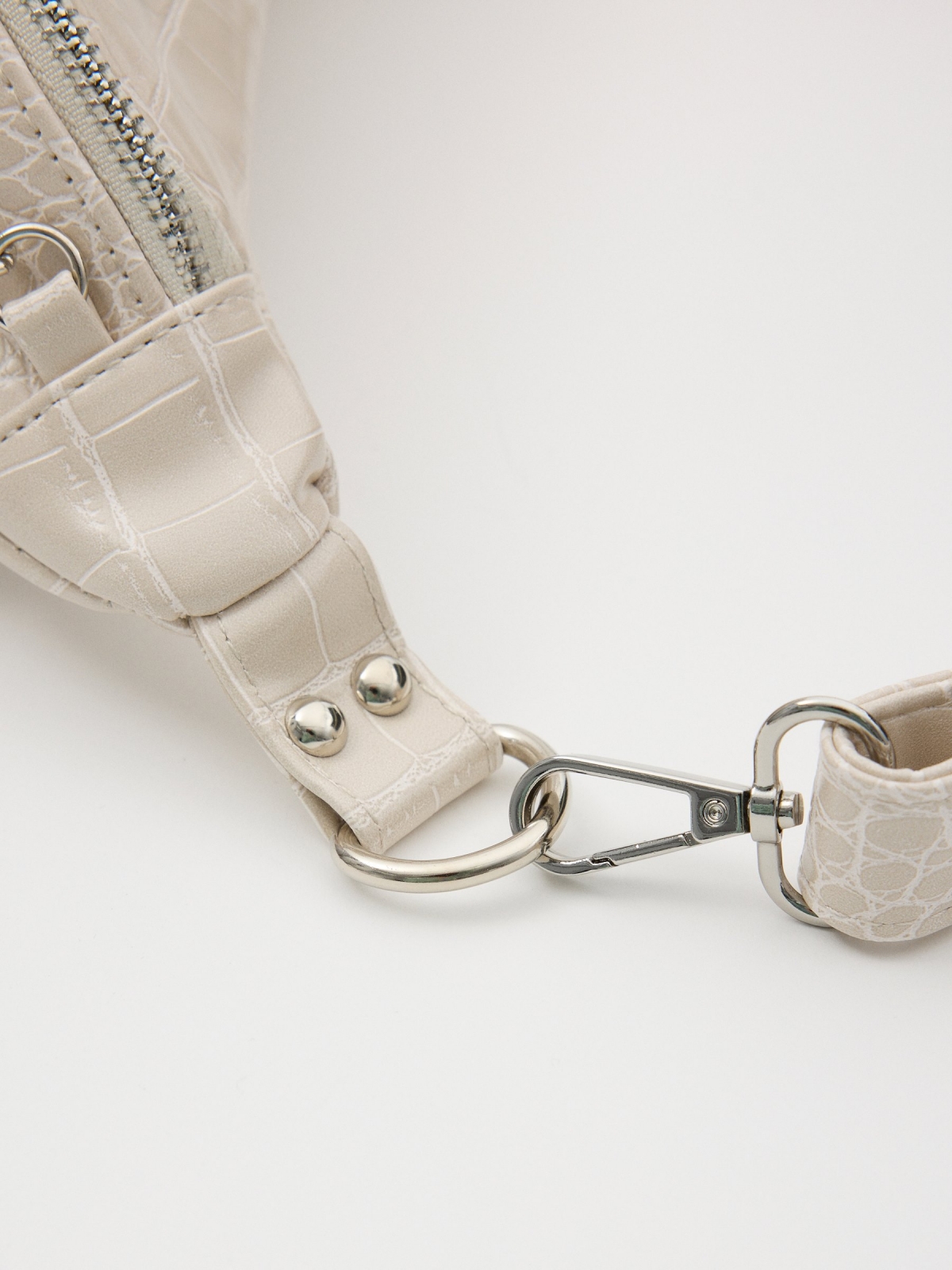 Leather effect fanny pack with chain detail view