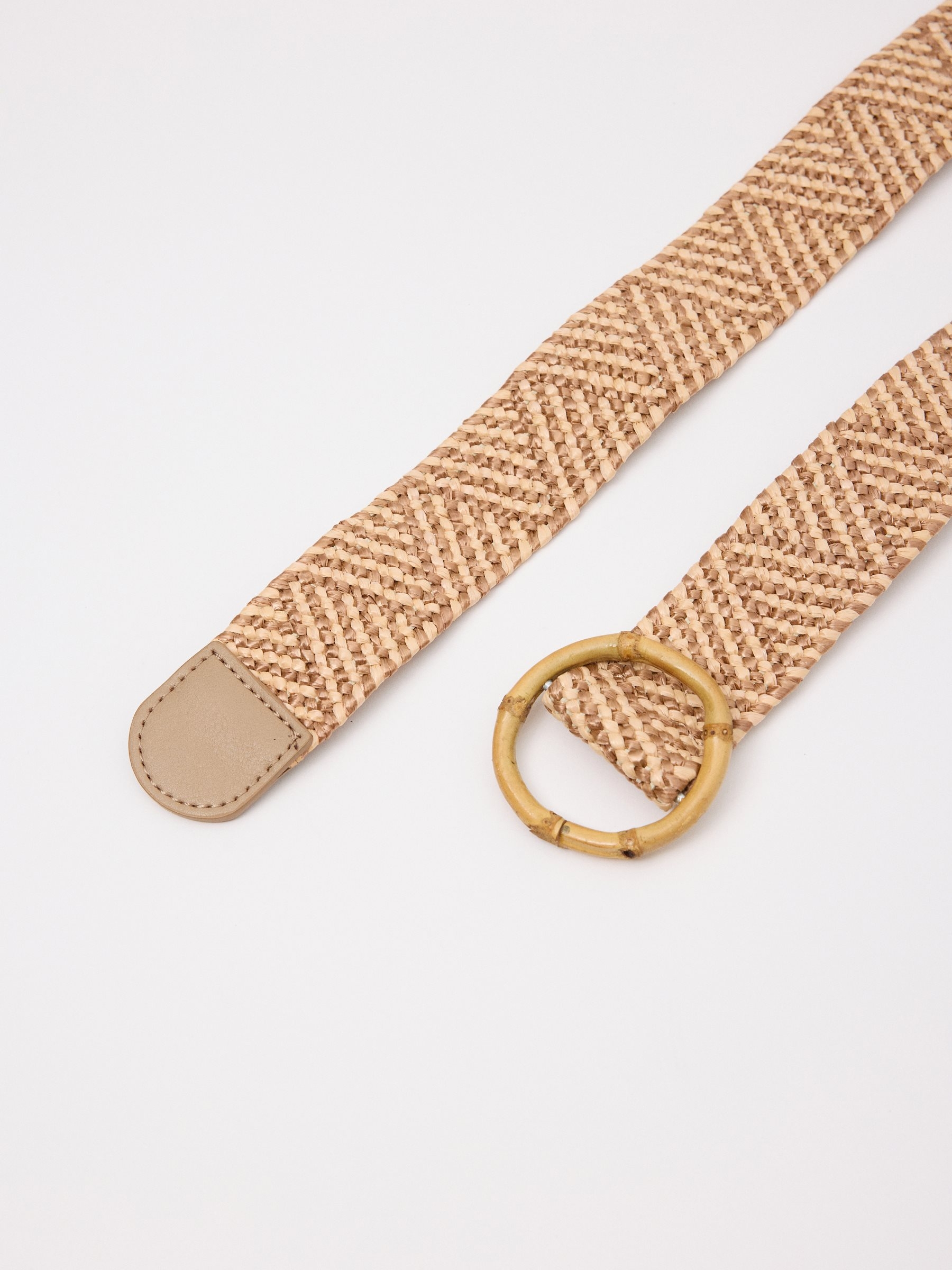 Cinturón elástico 5 cm beige vista enrollado