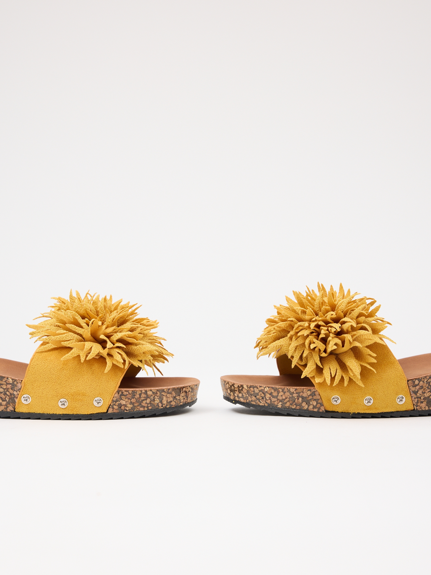 Cuña pala tira con flor mostaza