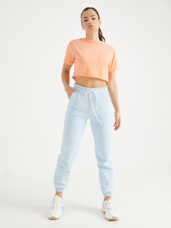 Camiseta de bolso recortada laranja vista geral frontal
