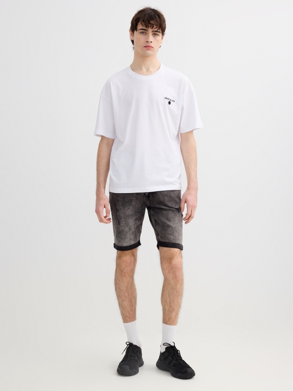 Skinny ripped denim Bermuda shorts black middle front view