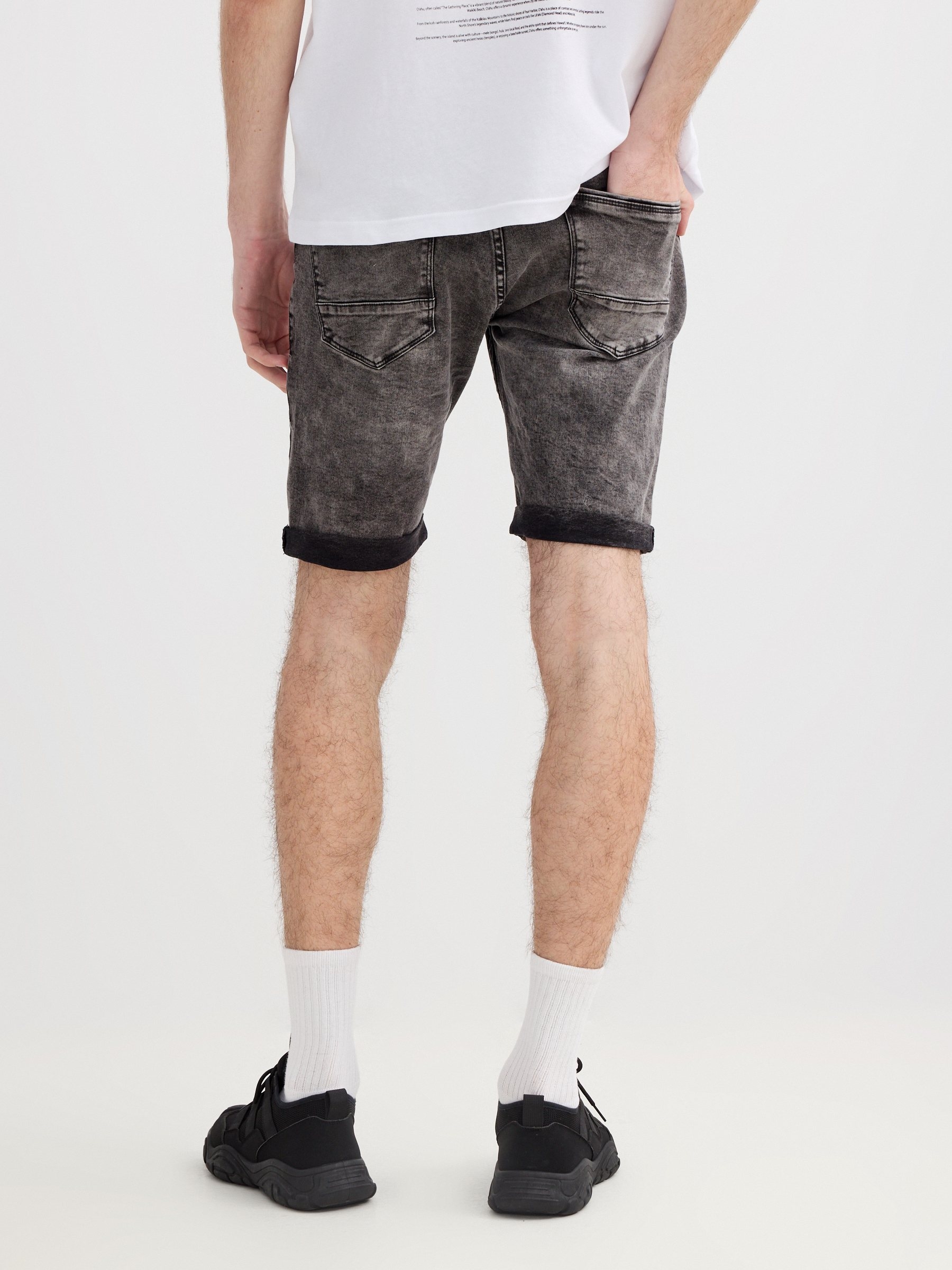 Skinny ripped denim Bermuda shorts black middle front view