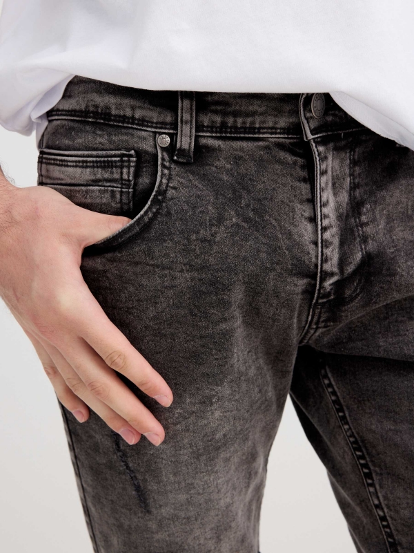 Skinny ripped denim Bermuda shorts black detail view