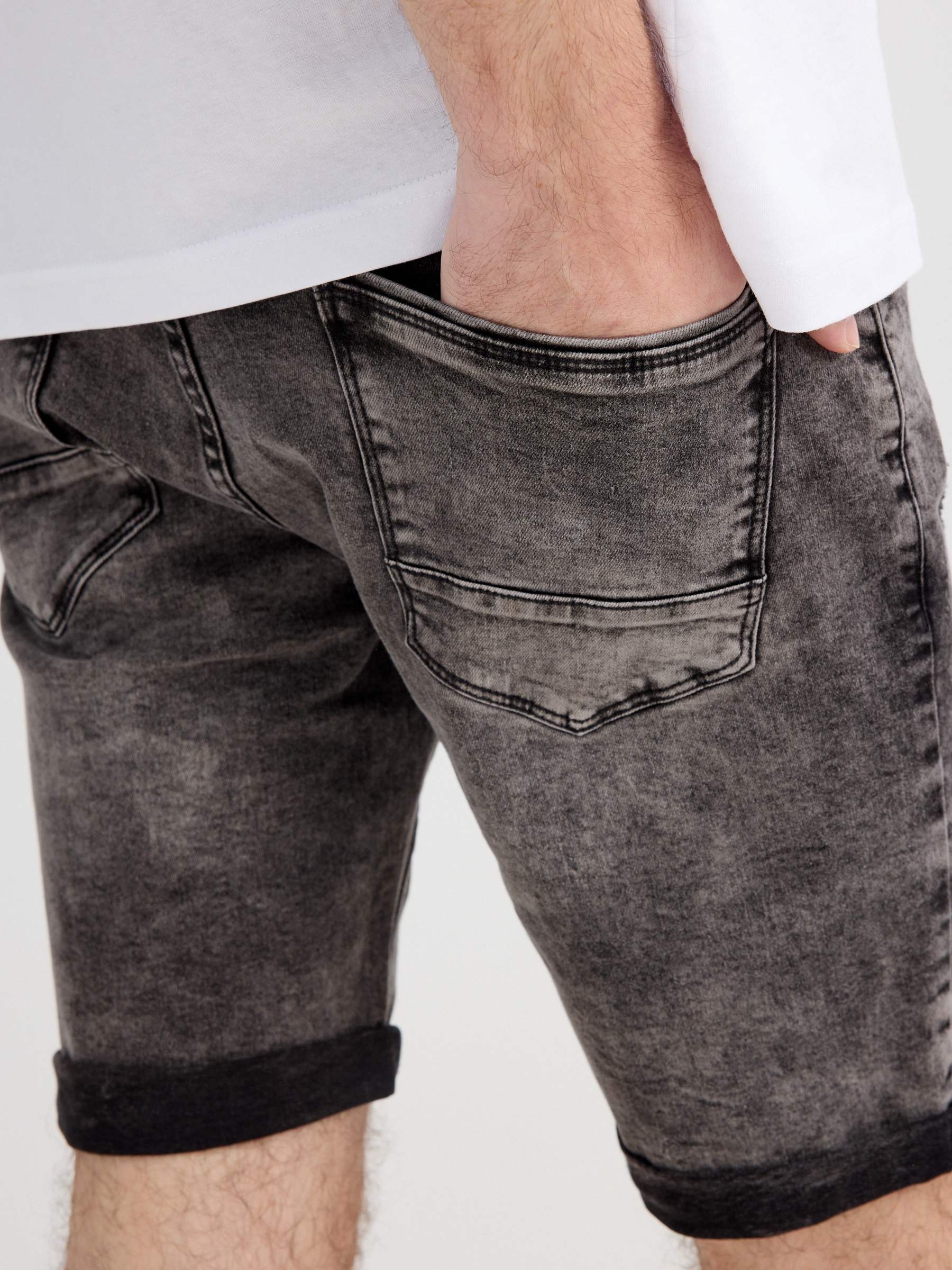 Skinny ripped denim Bermuda shorts black middle front view