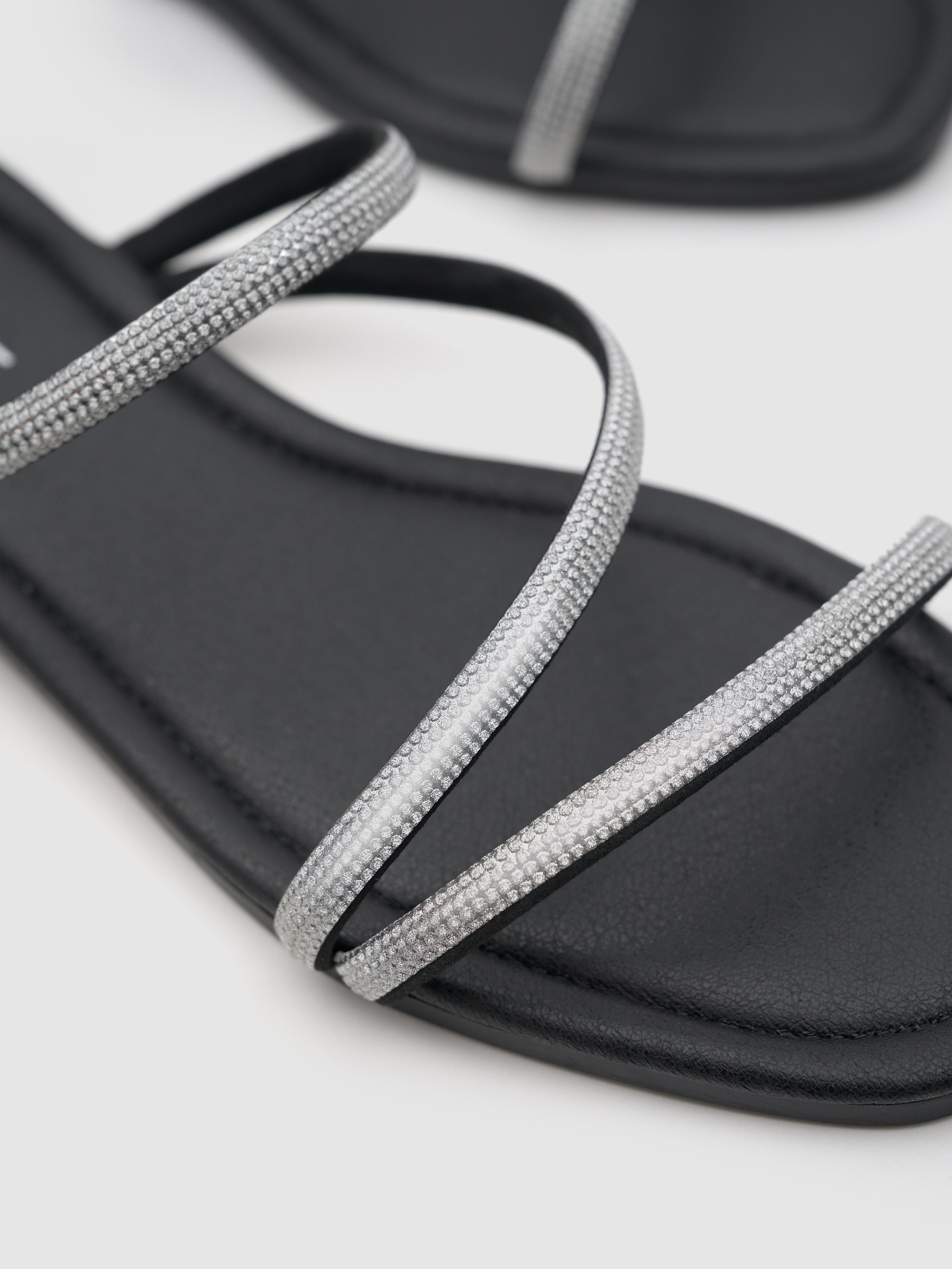 Flat canvas sandal with rhinestones black