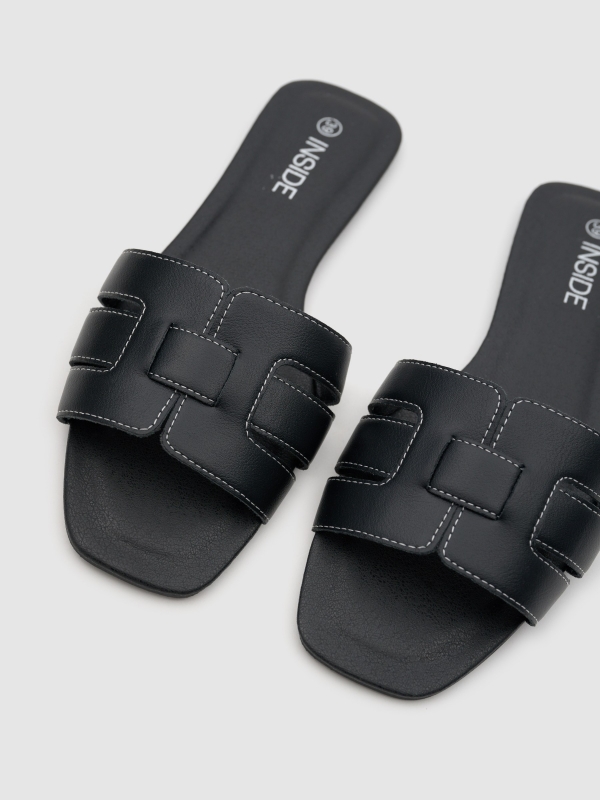 Stitched upper sandal black detail view