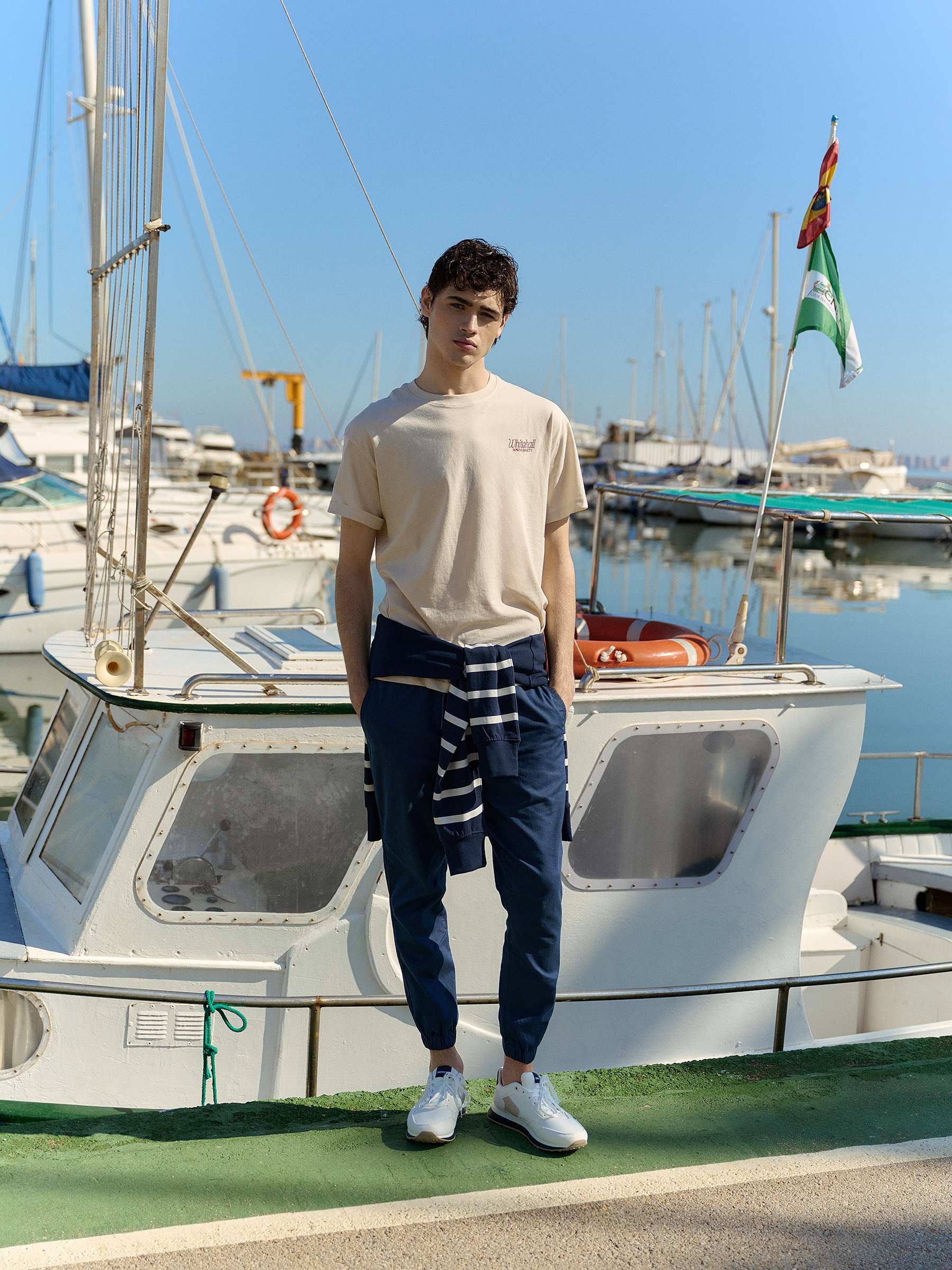 Elastic jogger pants petrol blue front view