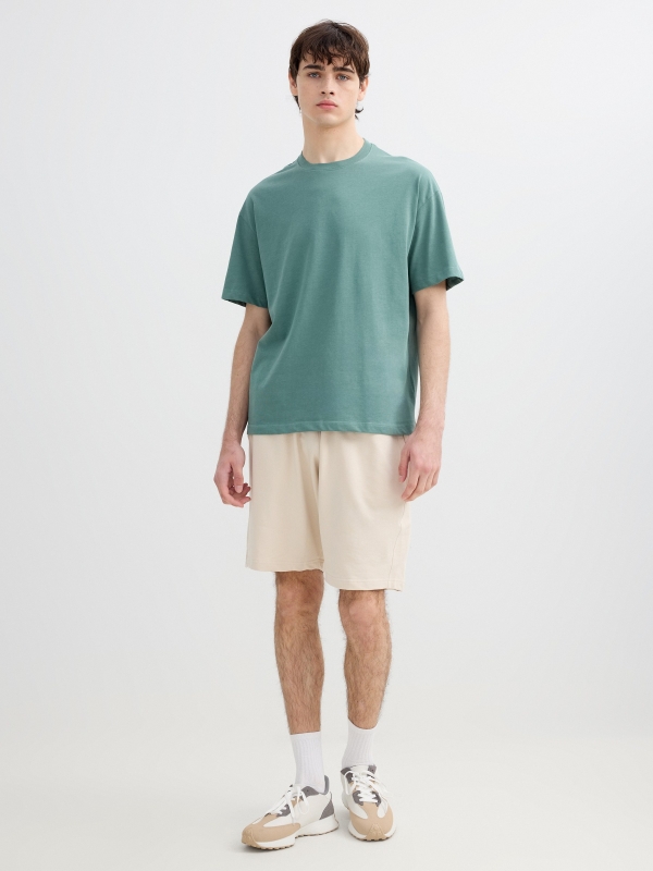 Bermuda jogger de felpa crudo vista media frontal