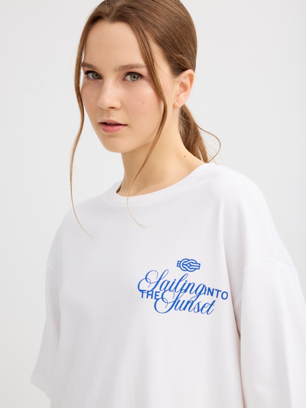 Oversized navy T-shirt white detail view