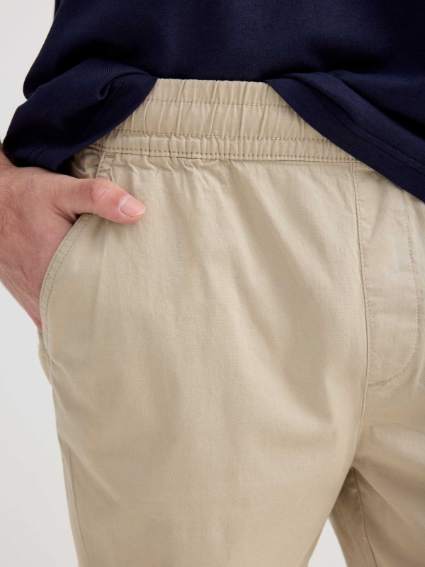 Gabardine jogger shorts raw detail view