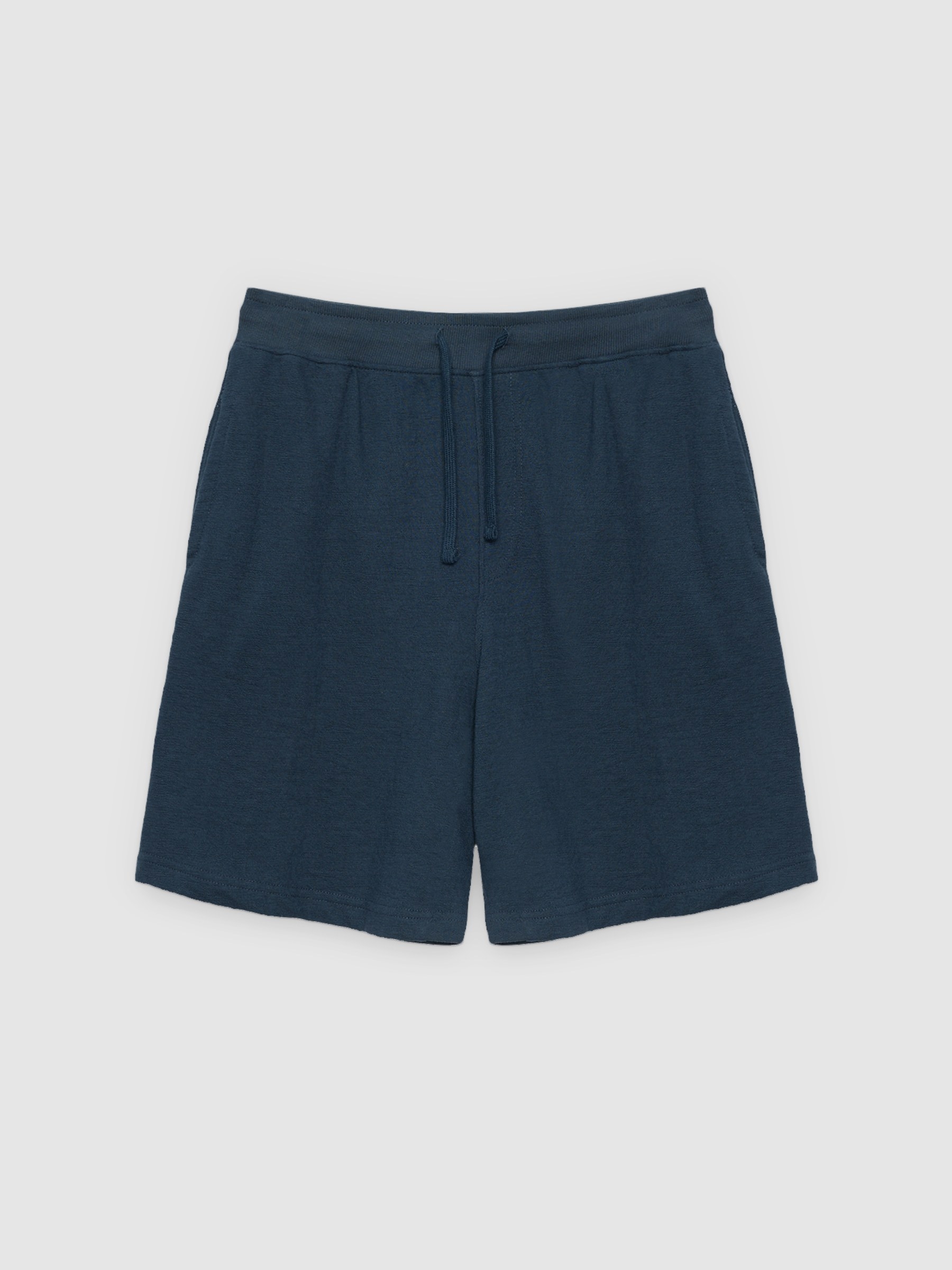 Bermuda esportiva de moletom azul petróleo vista meia frontal