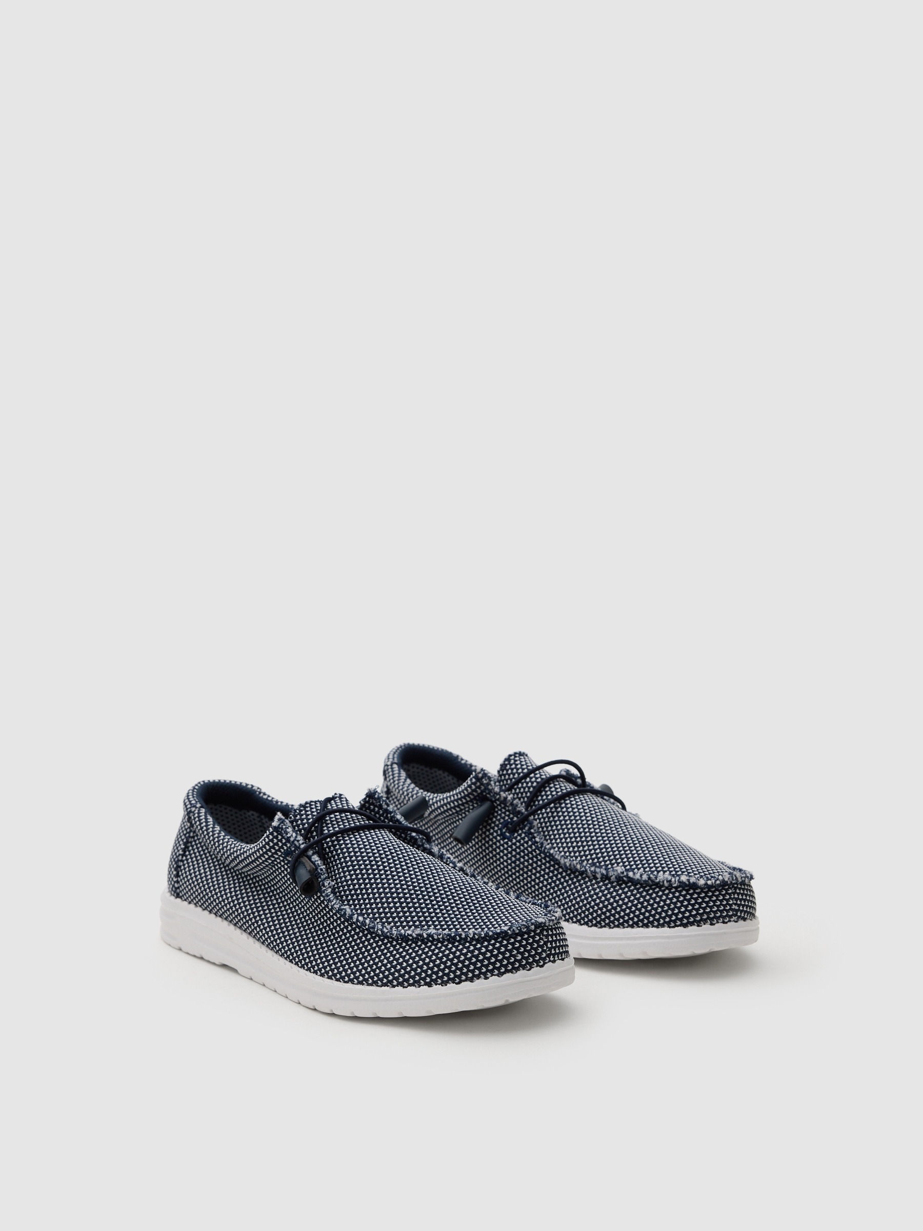 Deportiva lona elástica azul