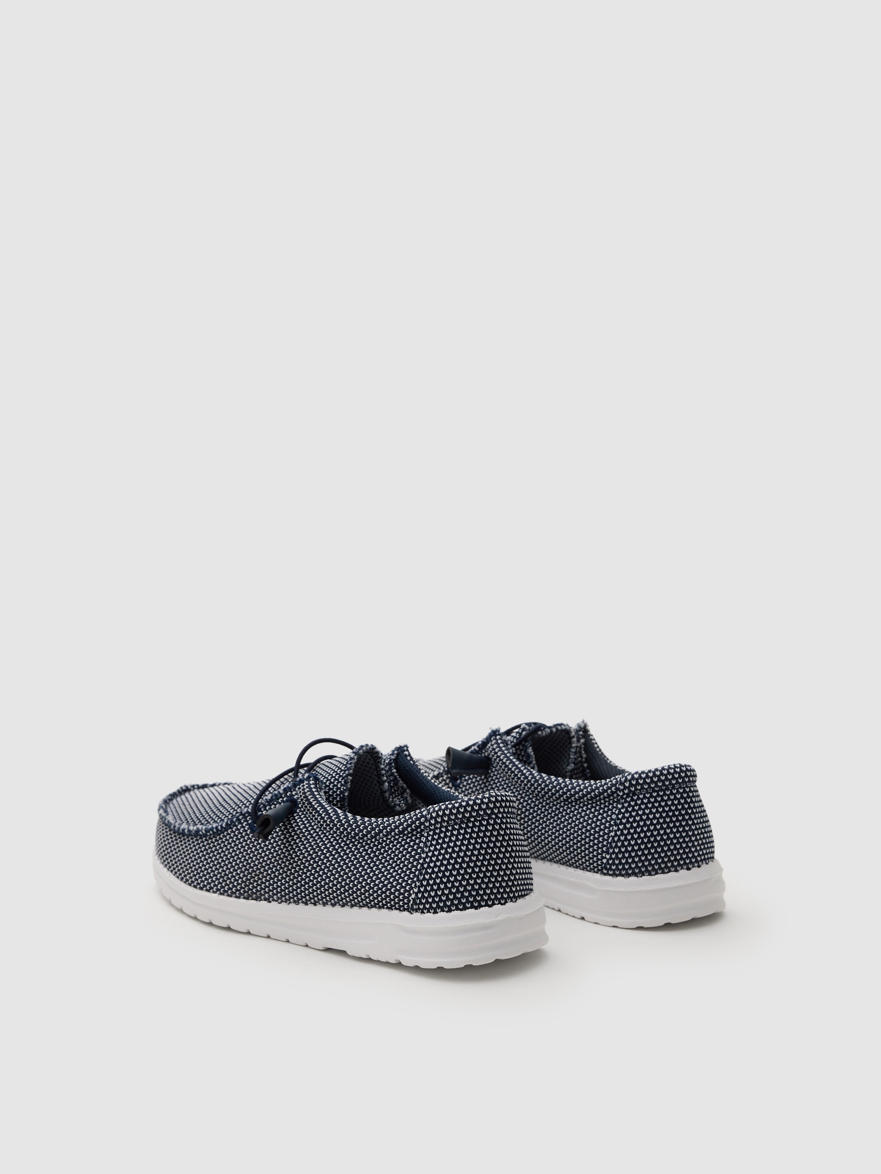 Deportiva lona elástica azul