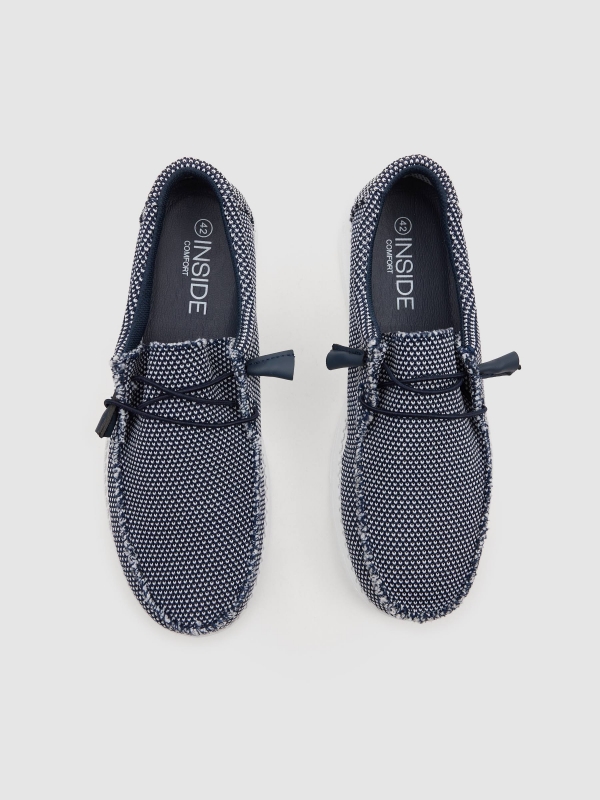 Deportiva lona elástica azul vista cenital