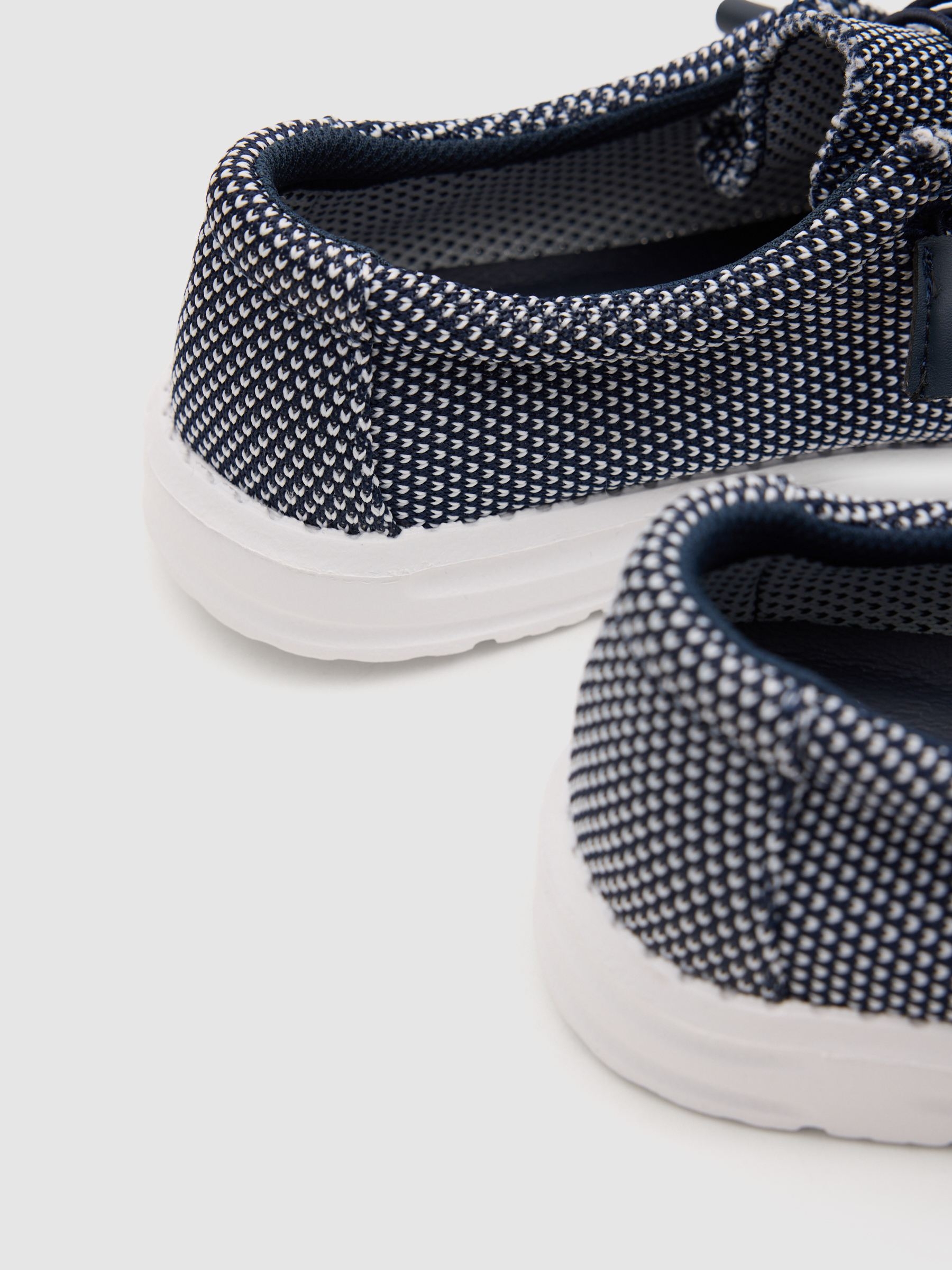 Deportiva lona elástica azul