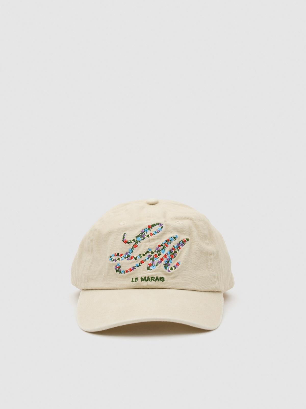 Embroidered trucker hat beige 45º front view