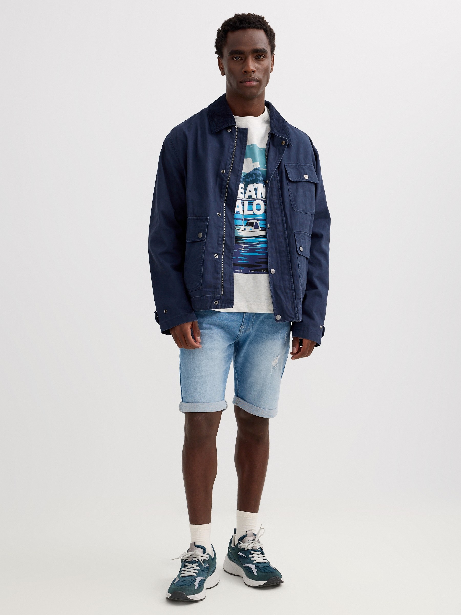 Bermuda jeans rasgada regular fit azul vista meia frontal