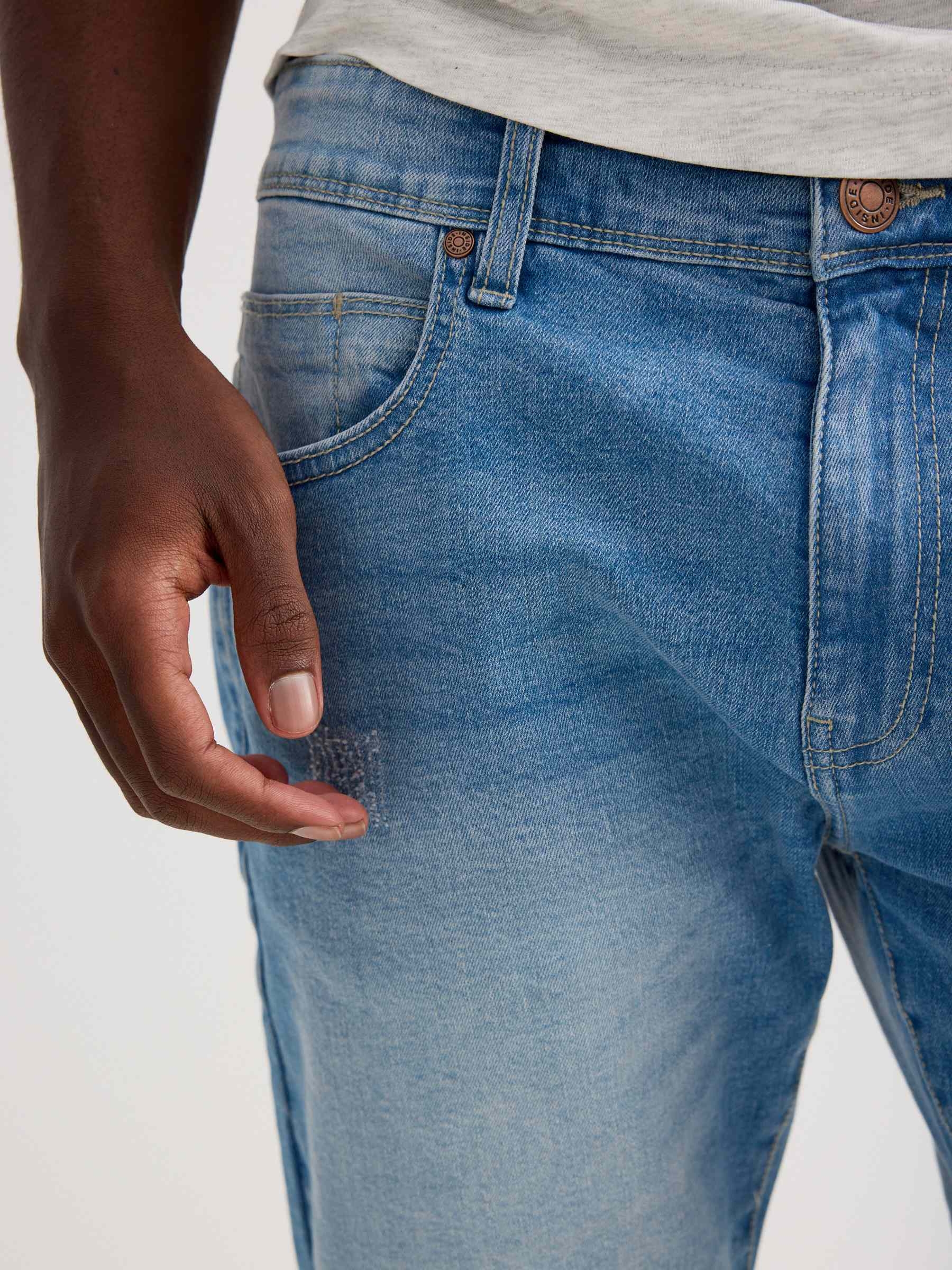 Regular fit ripped denim Bermuda shorts blue middle front view