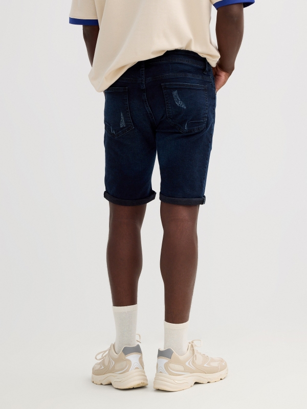 Bermuda jeans azul escuro rasgados azul vista geral frontal