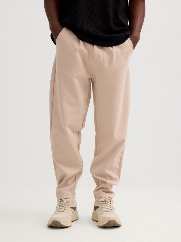 Jogger de felpa con cordones beige vista media frontal
