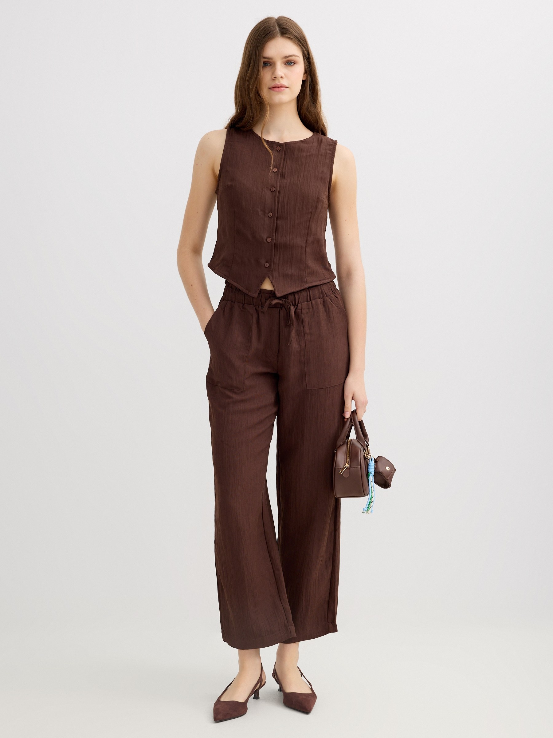 Textured button-placket top chocolate middle front view