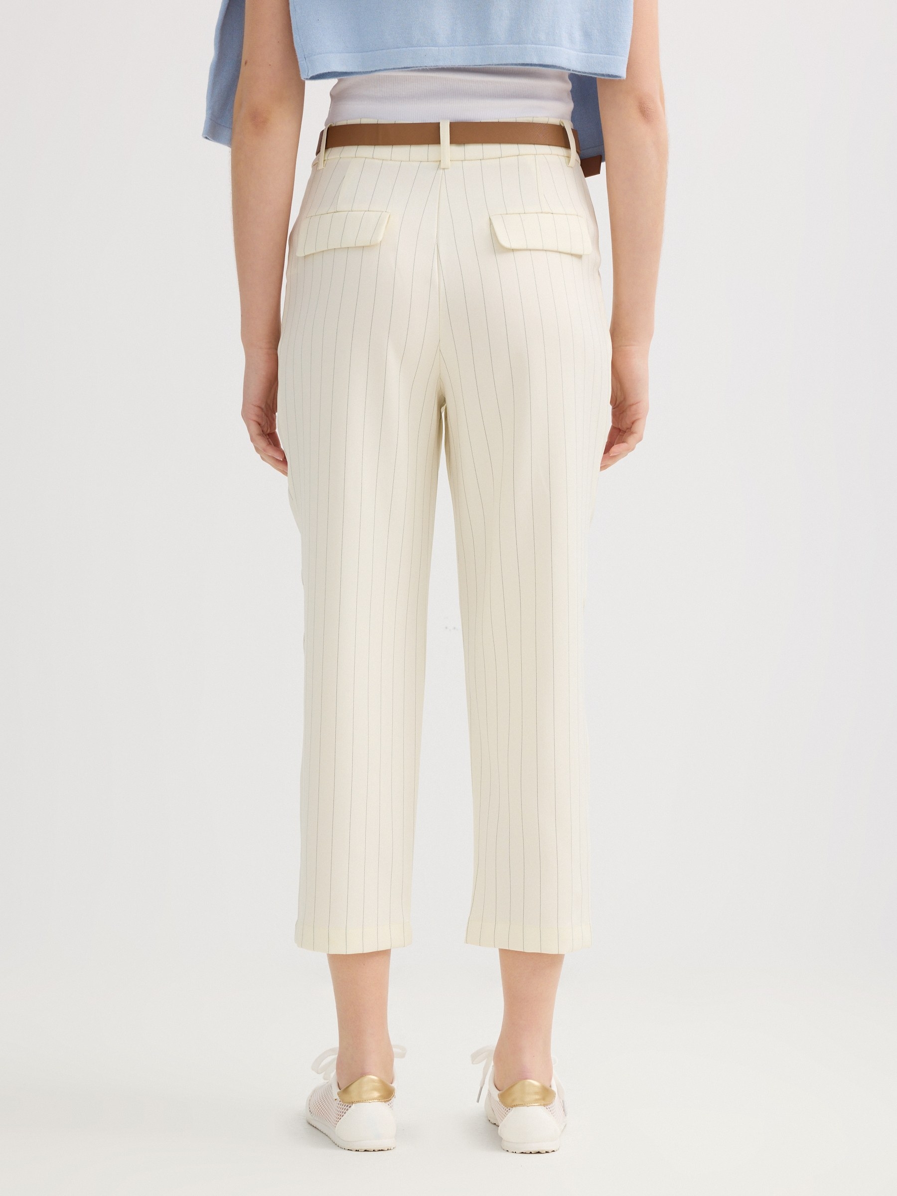 Striped capri pants with a belt raw front view