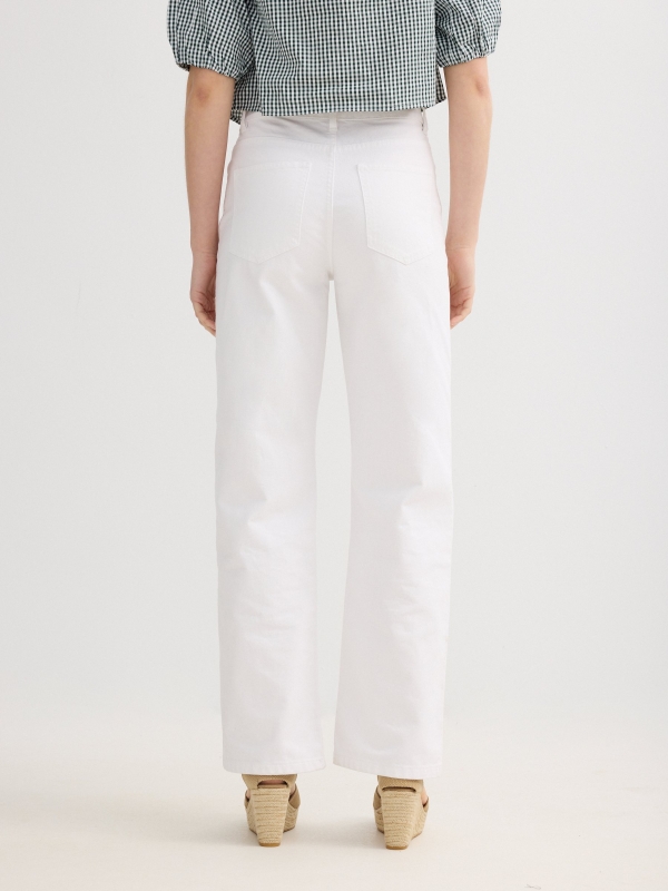 Pantalón bordado suizo wide leg blanco vista media trasera