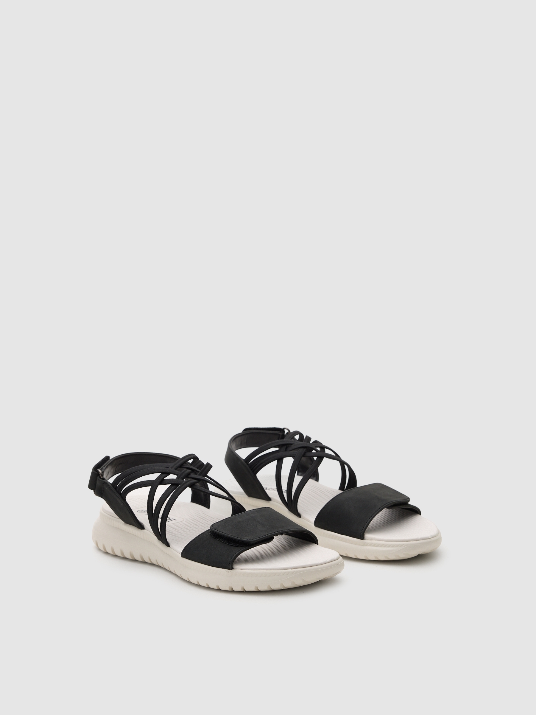 Flat sandal with crossed faux leather straps black